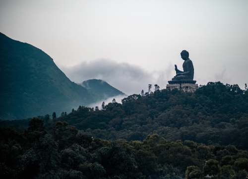 hong kong black and grey Buddha statue on top of hill buddha